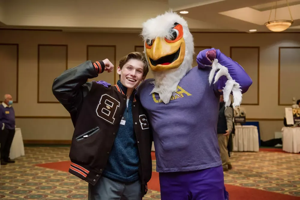 Eagle mascot with student 